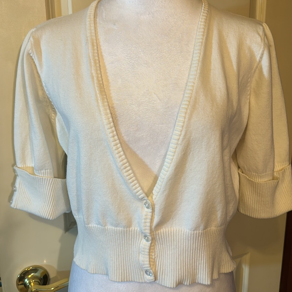 White crop style top buttons on sleeve light weight worn once